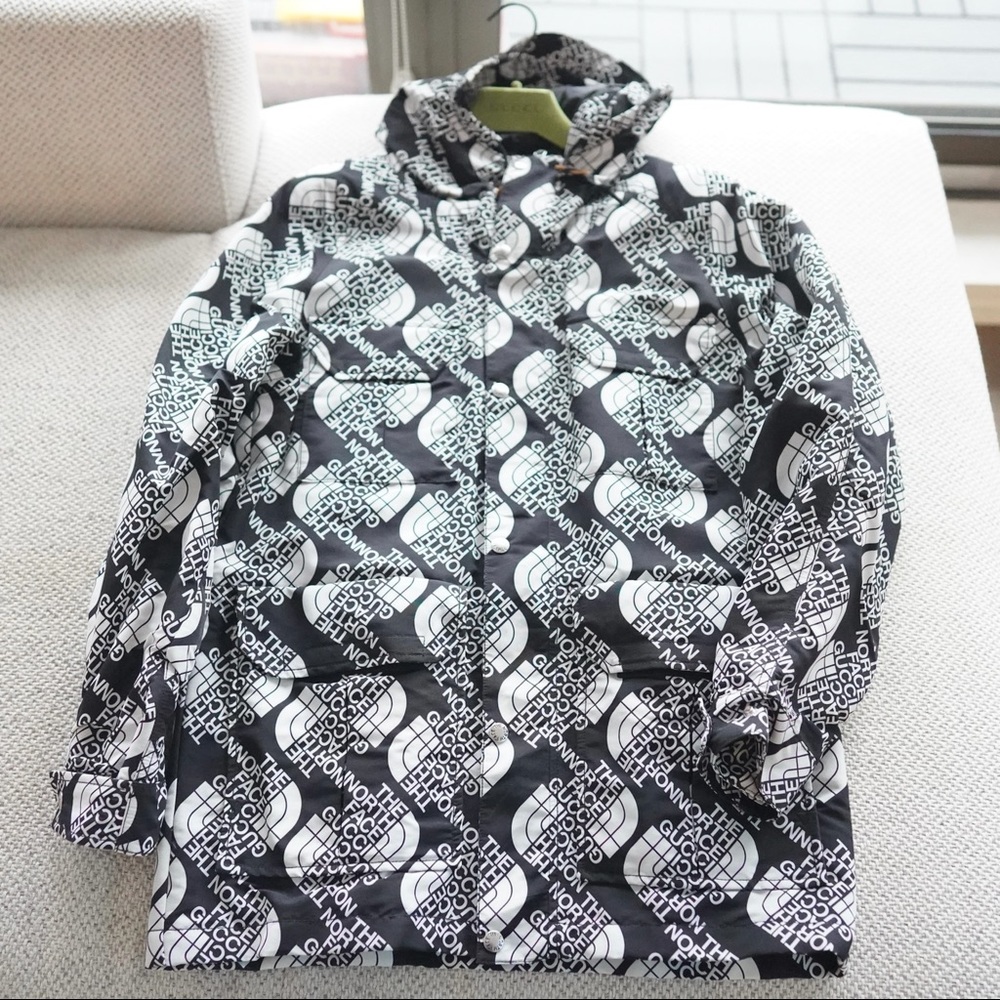 Gucci x The North Face all over logo hooded windbreaker